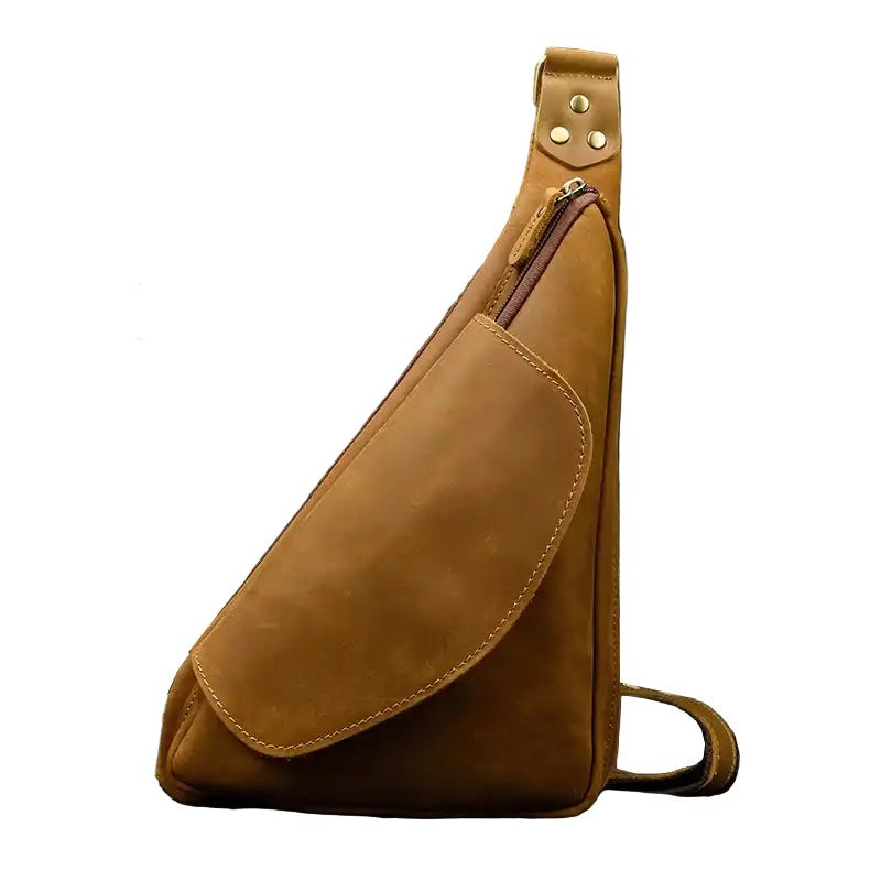 Brown leather sling bag with anti-theft design, front view.