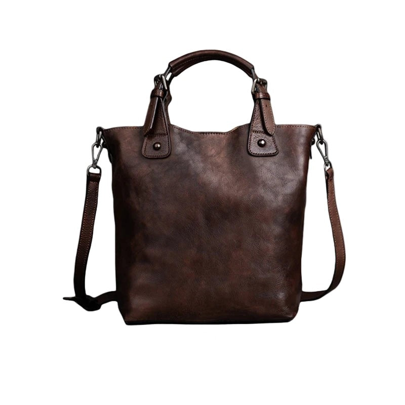 Coffee Brown leather handbag with a shoulder strap, front view.