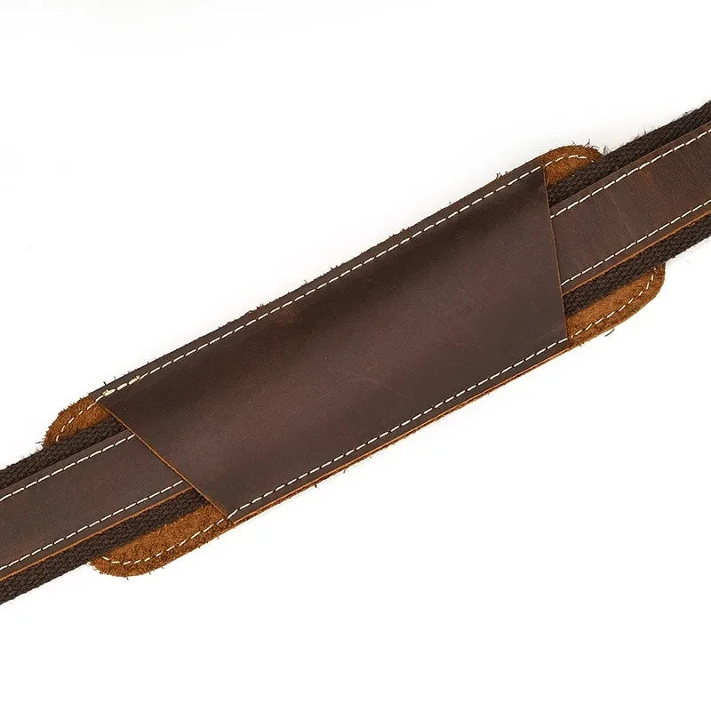 Brown leather briefcase belt with stitched details, highlighting style and durability.
