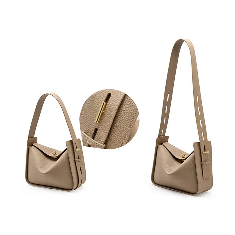 Elegant fashion with a gray leather bag with a long adjustable strap, ideal for various occasions, front view.