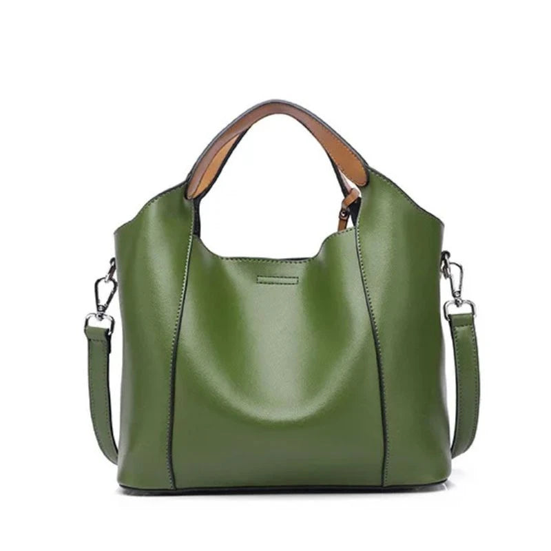 Army green leather bag with soft detachable soft handles and elegant charm, back view.