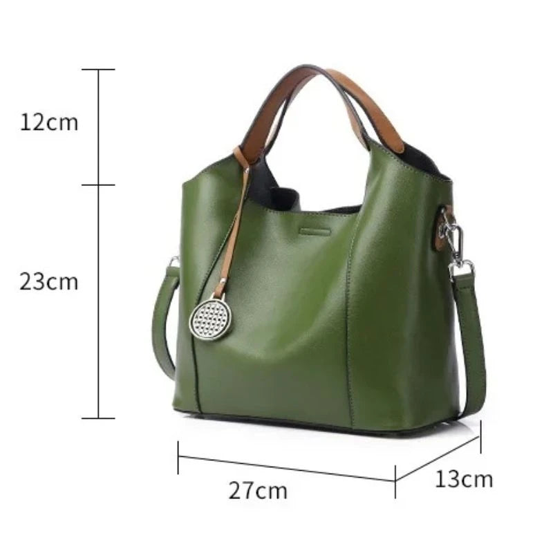 Army green leather bag measuring 27cm wide, 23cm high, 13cm deep, front view.