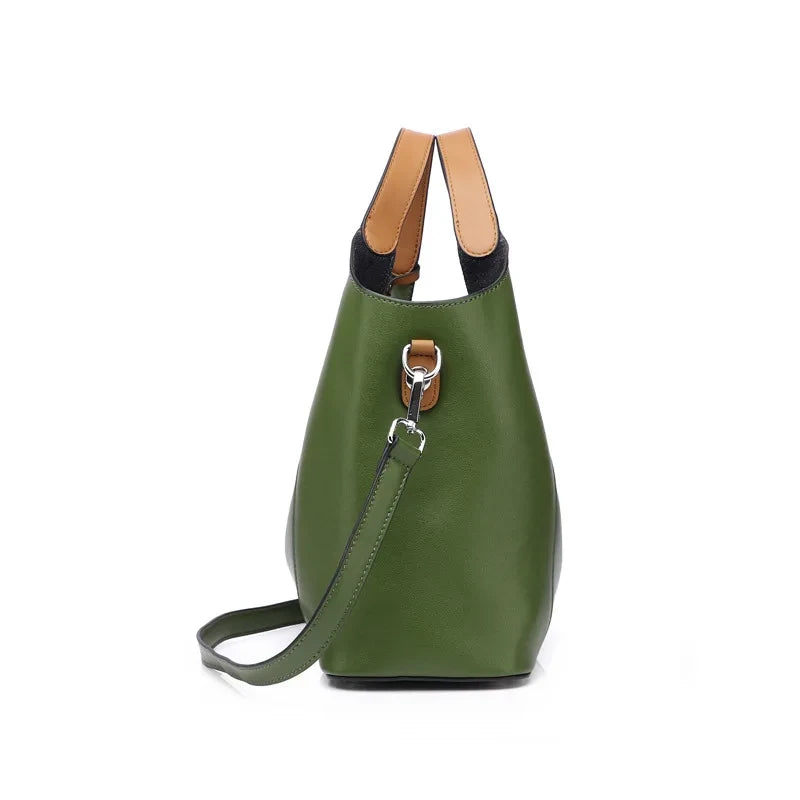 Army green leather bag with soft detachable soft handles and elegant charm, side view.