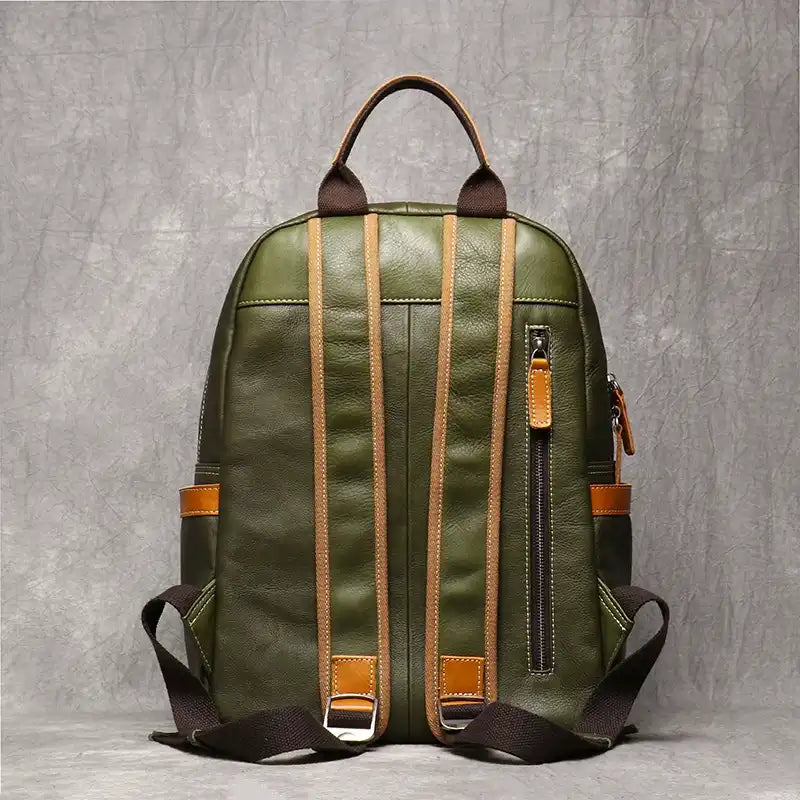 Fruit green leather backpack, with an elegant finish and comfortable straps, back view.