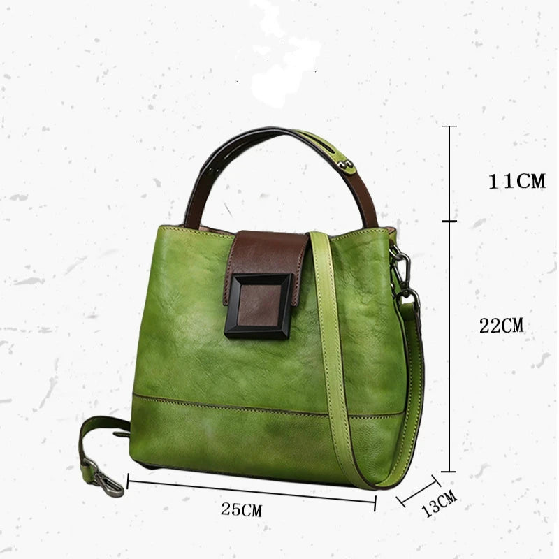 Green women's handbag with brown details, measuring 25CM x 22CM x 13CM, front view.
