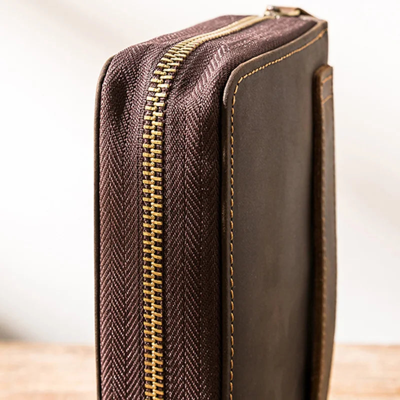 Elegant zippered storage case showcasing rich brown tones and detailed stitching.