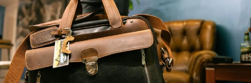 An elegant brown leather bag with  details, showcasing style and functionality in a sophisticated interior setting.