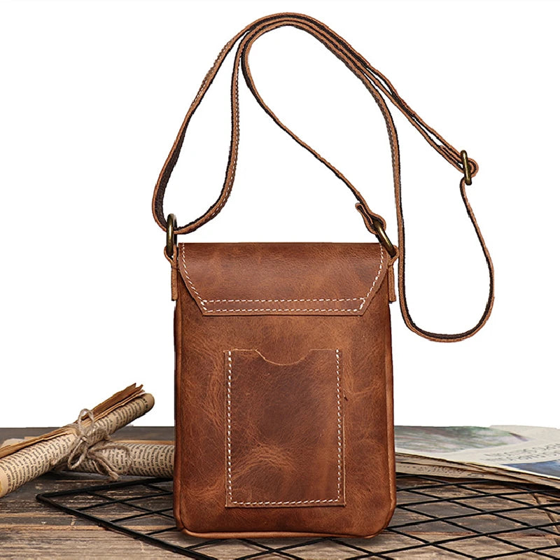 Vintage brown leather mini shoulder bag with adjustable strap - back view