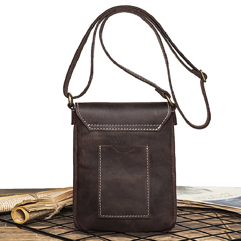 Vintage dark brown leather mini shoulder bag with adjustable strap - back view