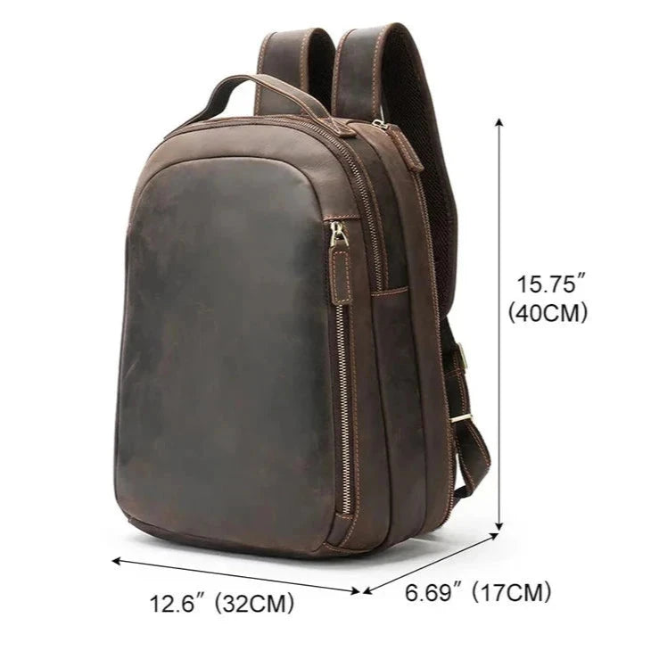 Brown leather backpack measuring 15.75 inches tall, 12.6 inches wide, and 6.69 inches deep, front view.
