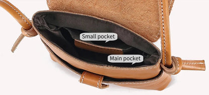 interior of a leather bag with two compartments ideal for organized storage of essential items.