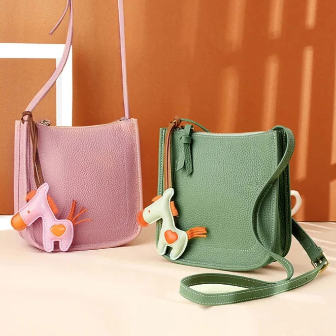 Trendy pastel-colored crossbody bags with cute colorful horse charm perfect for casual outings