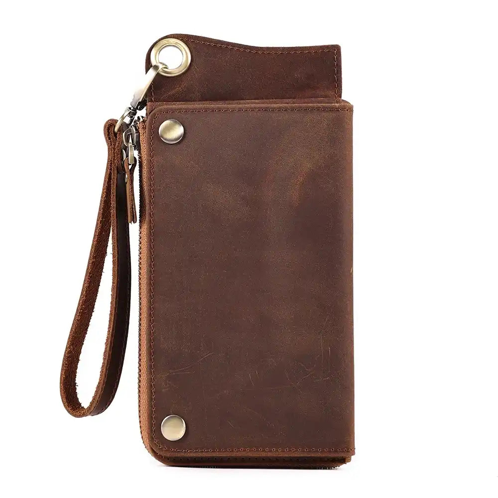 Brown leather long wallet, elegant and practical, with wrist strap and secure closure - front view.