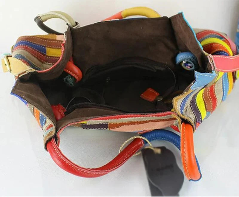 interior of a colorful leather bag, showcasing vibrant details and  and spacious interior compartments.