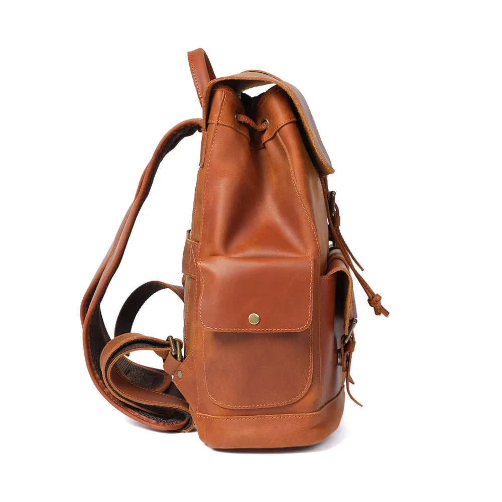 Brown leather backpack with side pockets, ideal for daily use or travel, offering style and practicality - side view