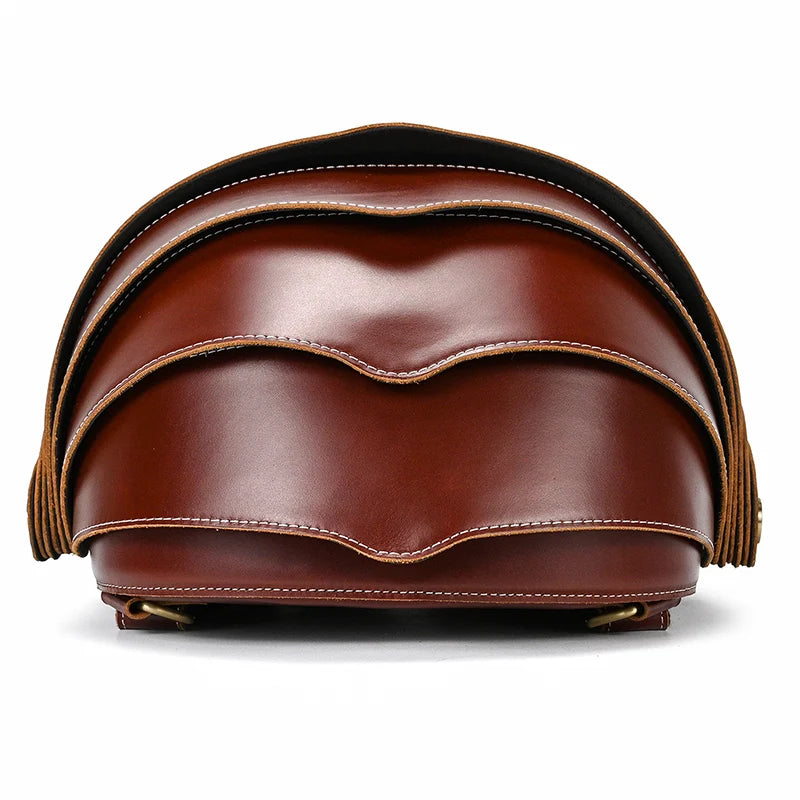 Modern style leather backpack in brown tone, with layered wavy design - top view.