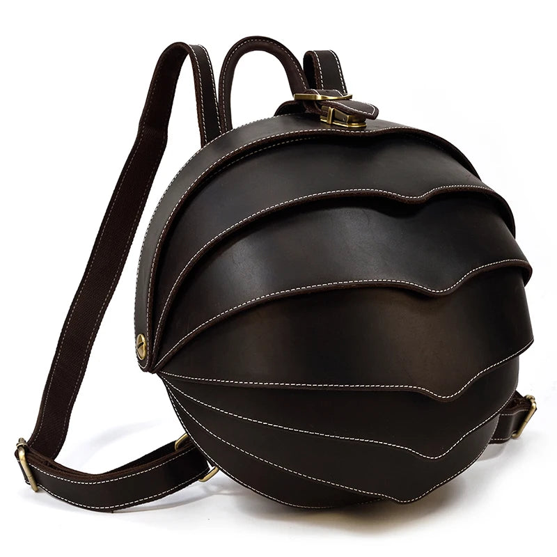 Dark brown leather backpack with an exclusive wavy design, highlighting its elegant stitching and rounded shape, front view.