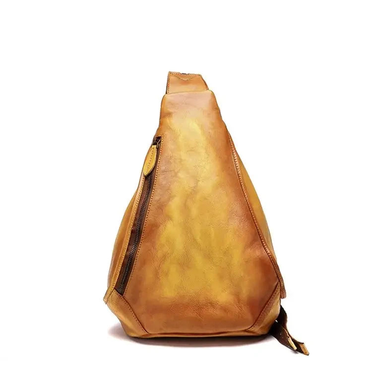 Vintage yellow shoulder bag with a unique triangular design - front view.